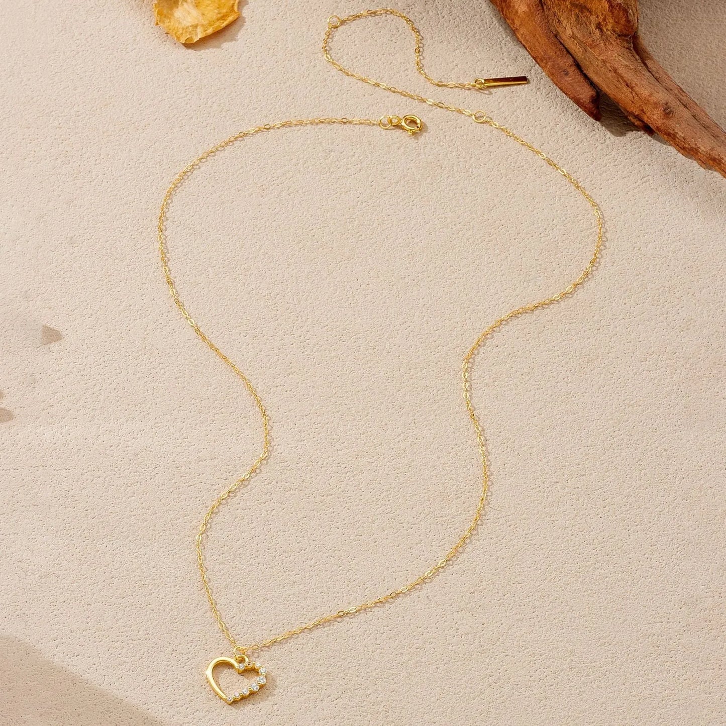 S925 sterling silver hollow heart pendant necklace on a regular chain with gold-plated finish options