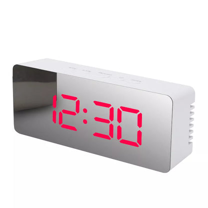LED Digital Mirror Alarm Clock with customizable light colors on a desktop