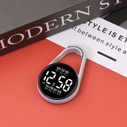 Mini digital LED electronic watch with plastic strap in various colours like fluorescent green and black on display.