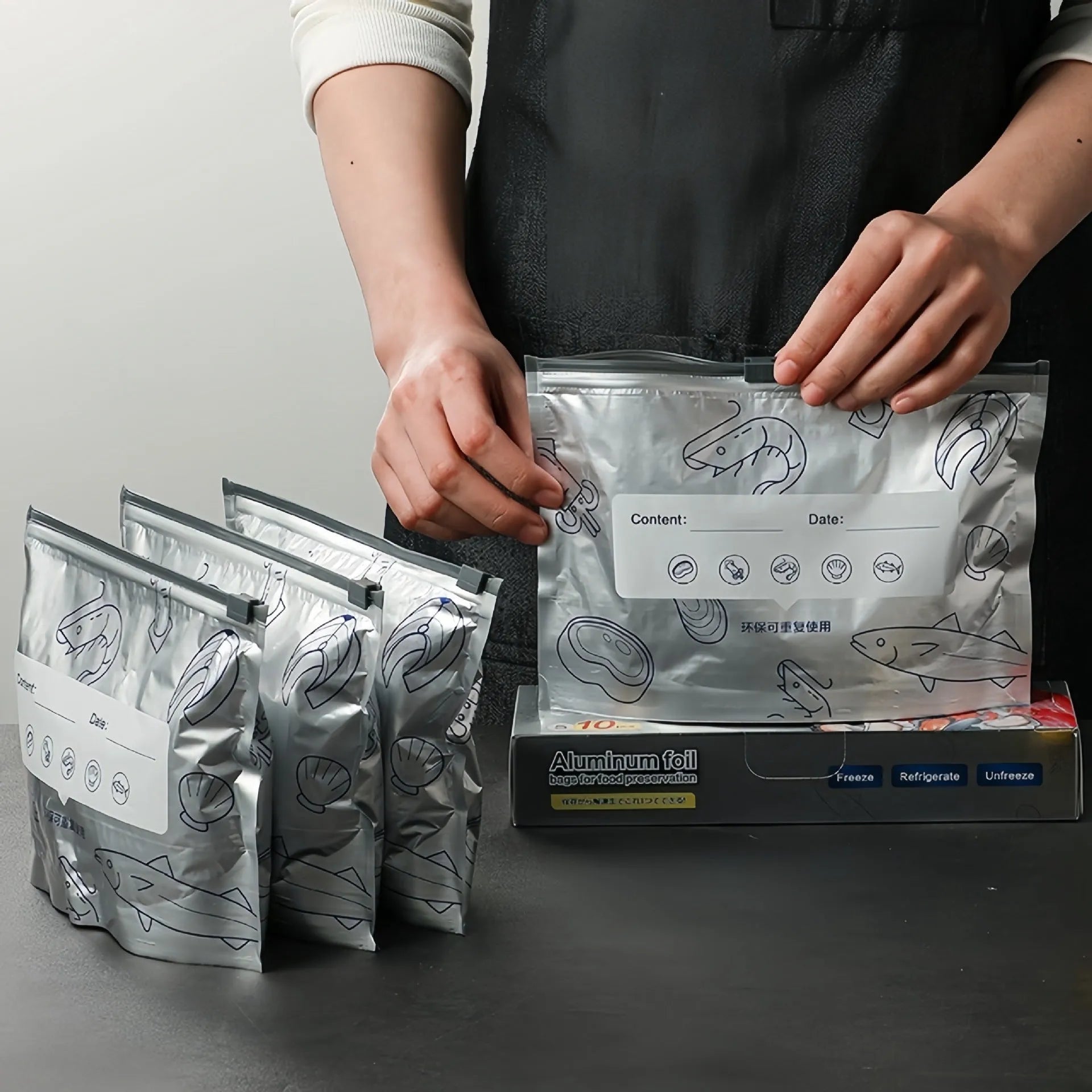 Set of aluminium foil sealed fresh bags in small, medium, and large sizes for food storage