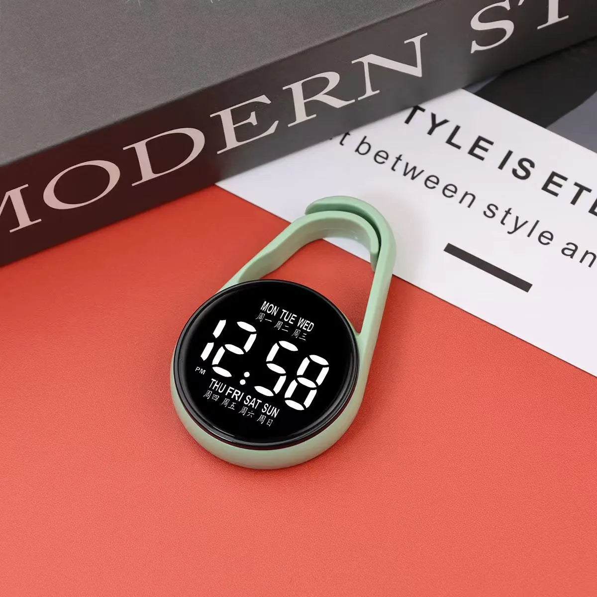 Mini digital LED electronic watch with plastic strap in various colours like fluorescent green and black on display.