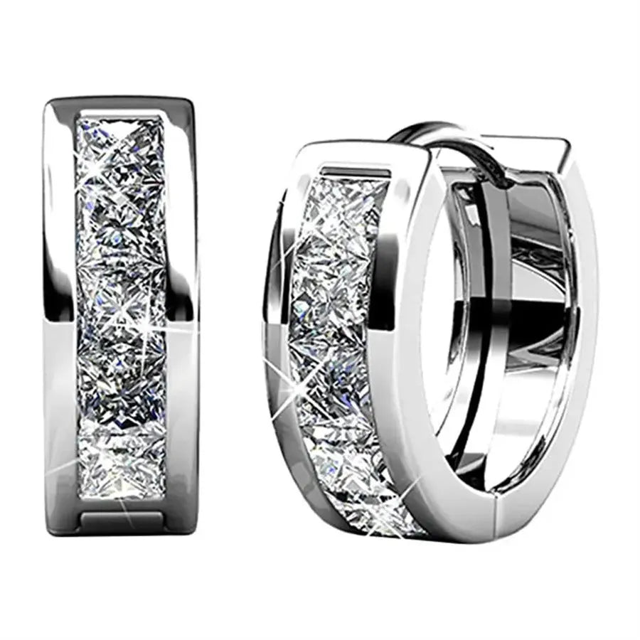 Geometric quadrilateral earrings in gold or silver plating, showing structured design and smooth surface finish