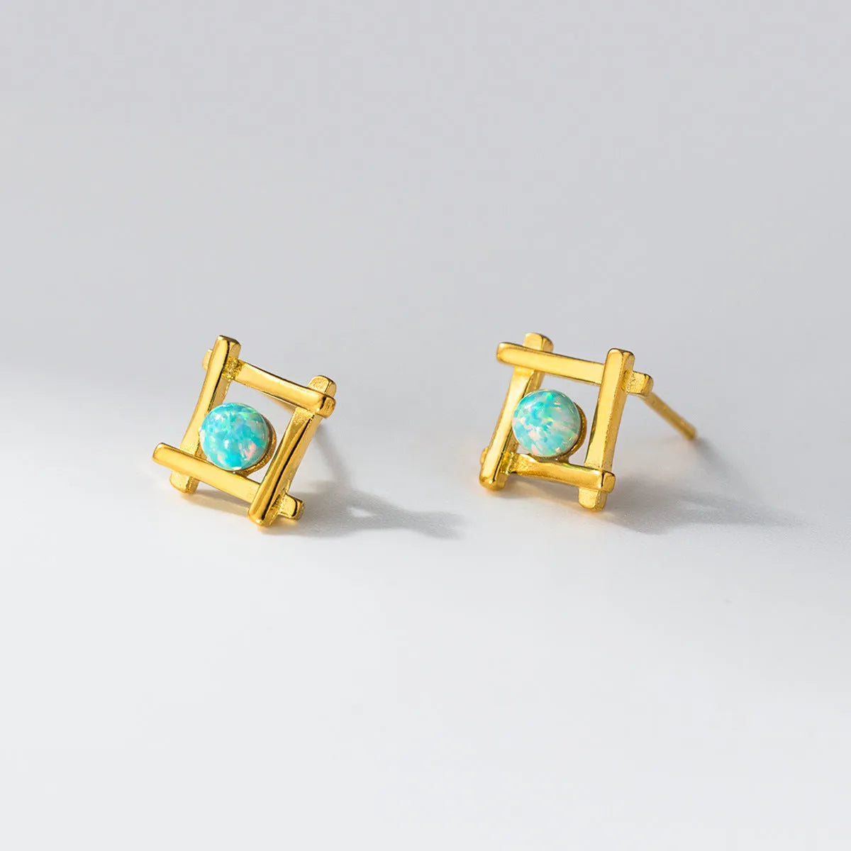 Geometric cross quadrangle stud earrings in S925 silver with silver or gold plating options