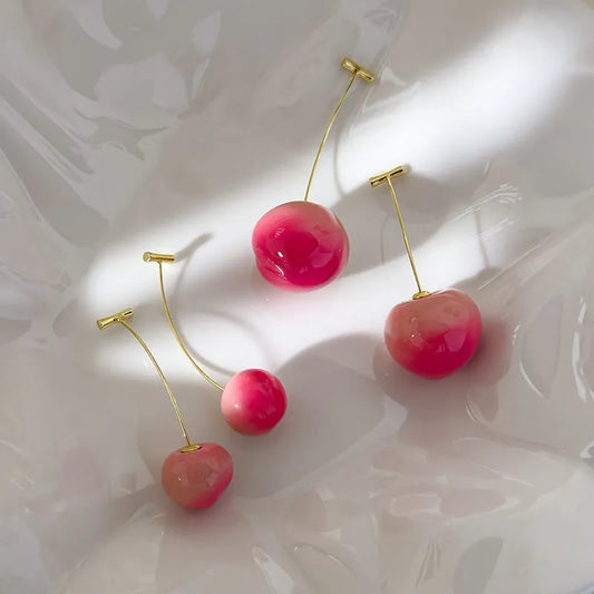 Acrylic peach-shaped earrings with copper posts in small and large size options