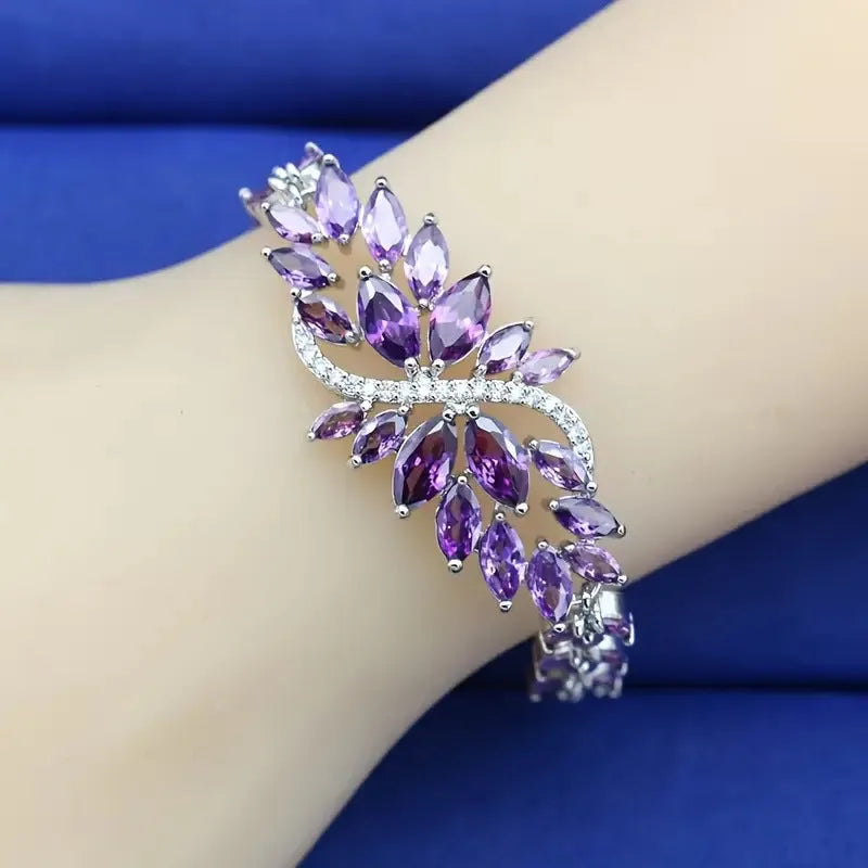Copper bracelet with real gold electroplating featuring colour zircon stones and ice flower elements in an affordable luxury style, available in blue, green, white, purple, or colour mix designs