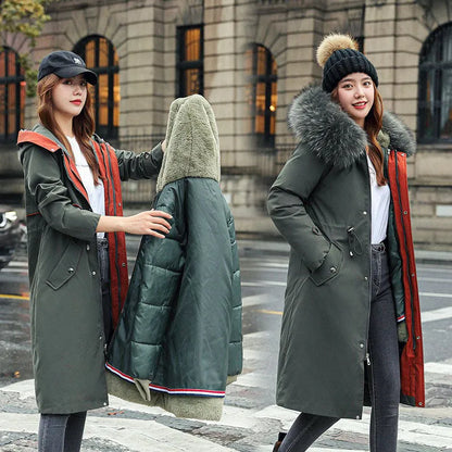 Long white women's fleece trench coat with down cotton padding on a hanger.
