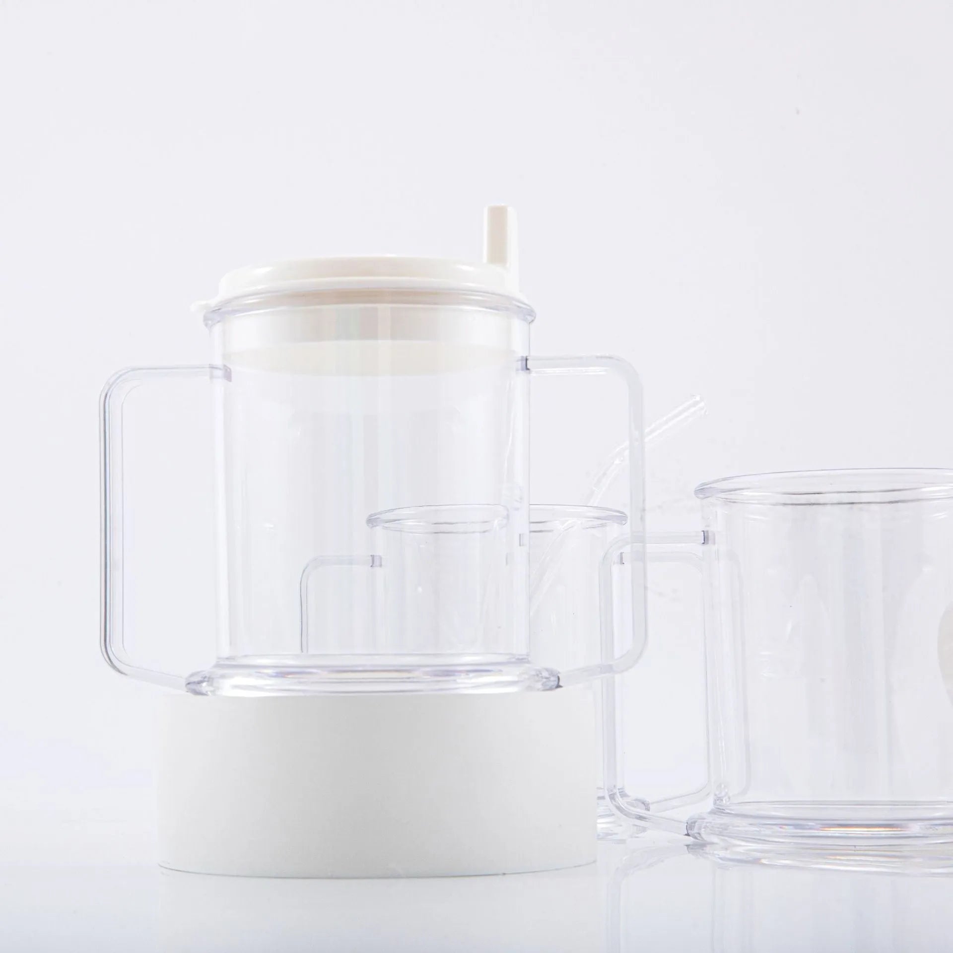 Transparent spill-proof drinking cup showing 14cm height, modern design, PP material construction