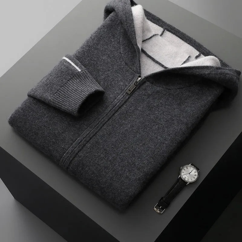Man's dark blue zip-up cashmere cardigan with a half-high collar, shown on a hanger.