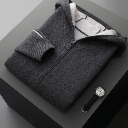 Man's dark blue zip-up cashmere cardigan with a half-high collar, shown on a hanger.