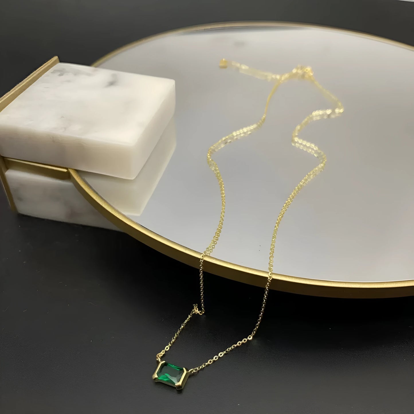 Gold geometric pendant necklace with quadrilateral shape and inlaid Lvzuan stones