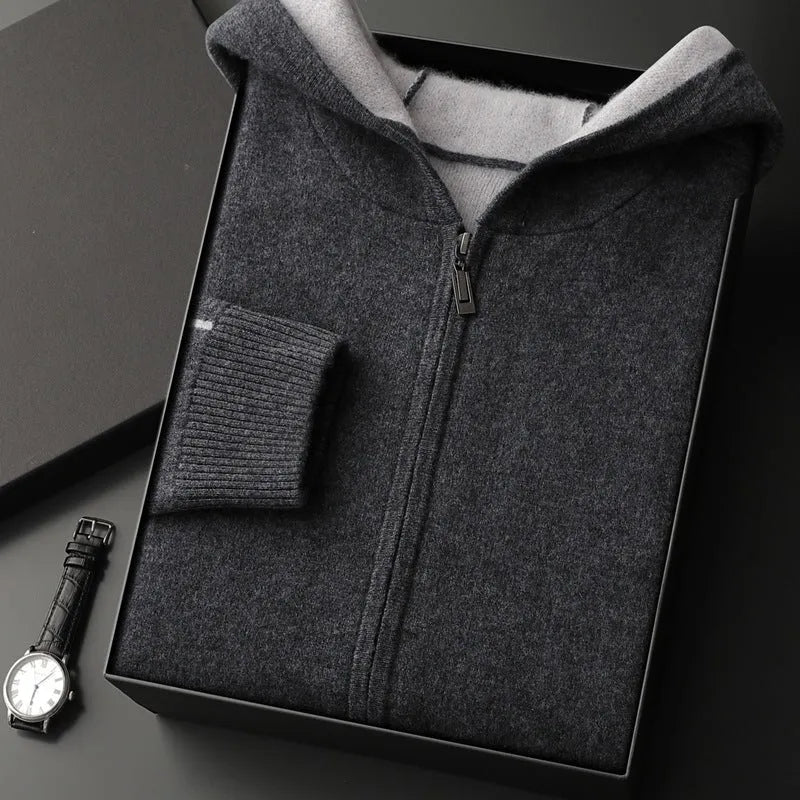 Man's dark blue zip-up cashmere cardigan with a half-high collar, shown on a hanger.