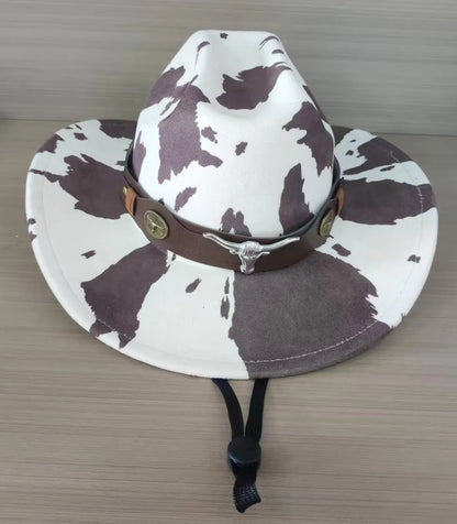 Brown leather velvet cowboy hat with curved brim and conical crown.
