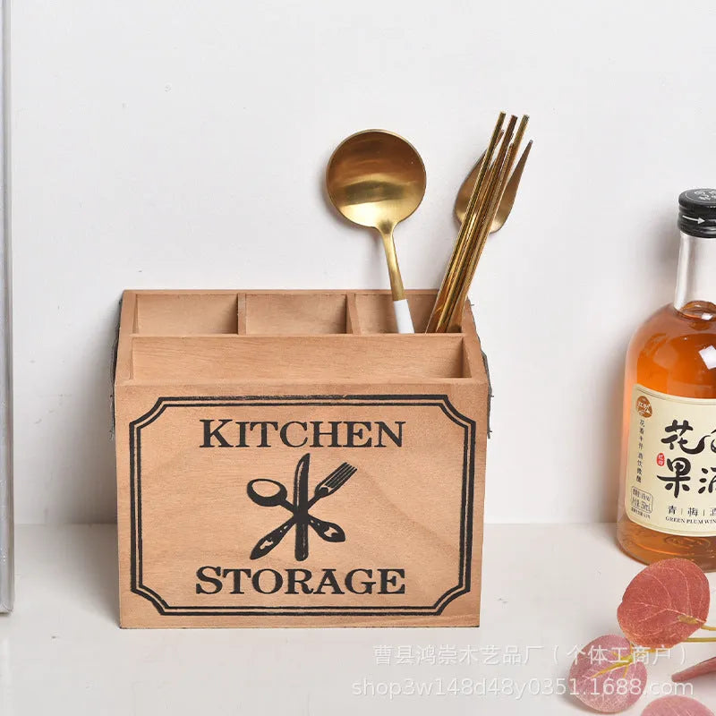 Solid wood kitchen storage box with internal grid divider for organising cutlery and chopsticks.