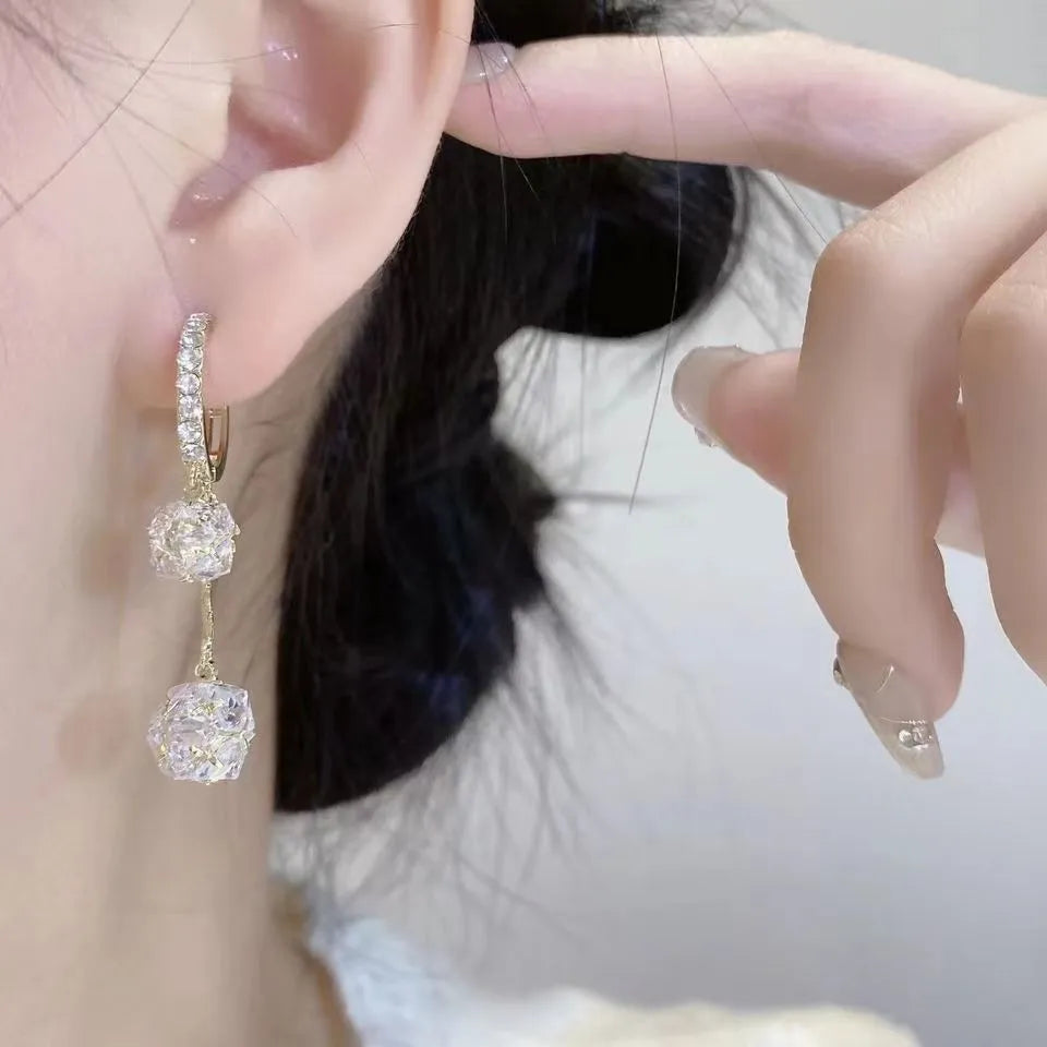 Silver colour drop shape earrings with rhinestone ball and tassel ball confession balloon design