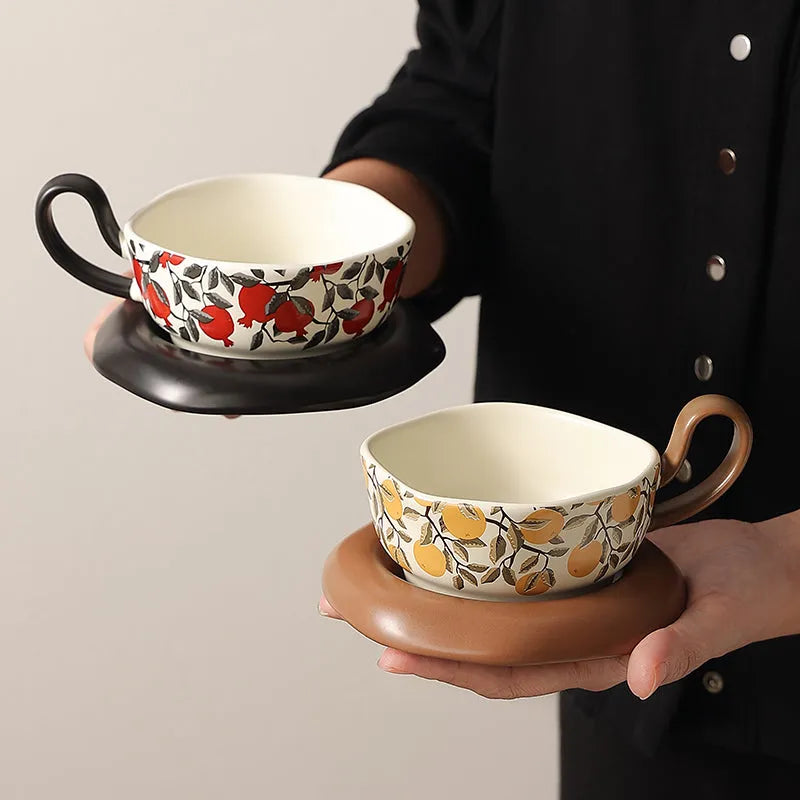 Antique-style ceramic coffee cup and saucer set with 210ml capacity in black or orange medieval designs