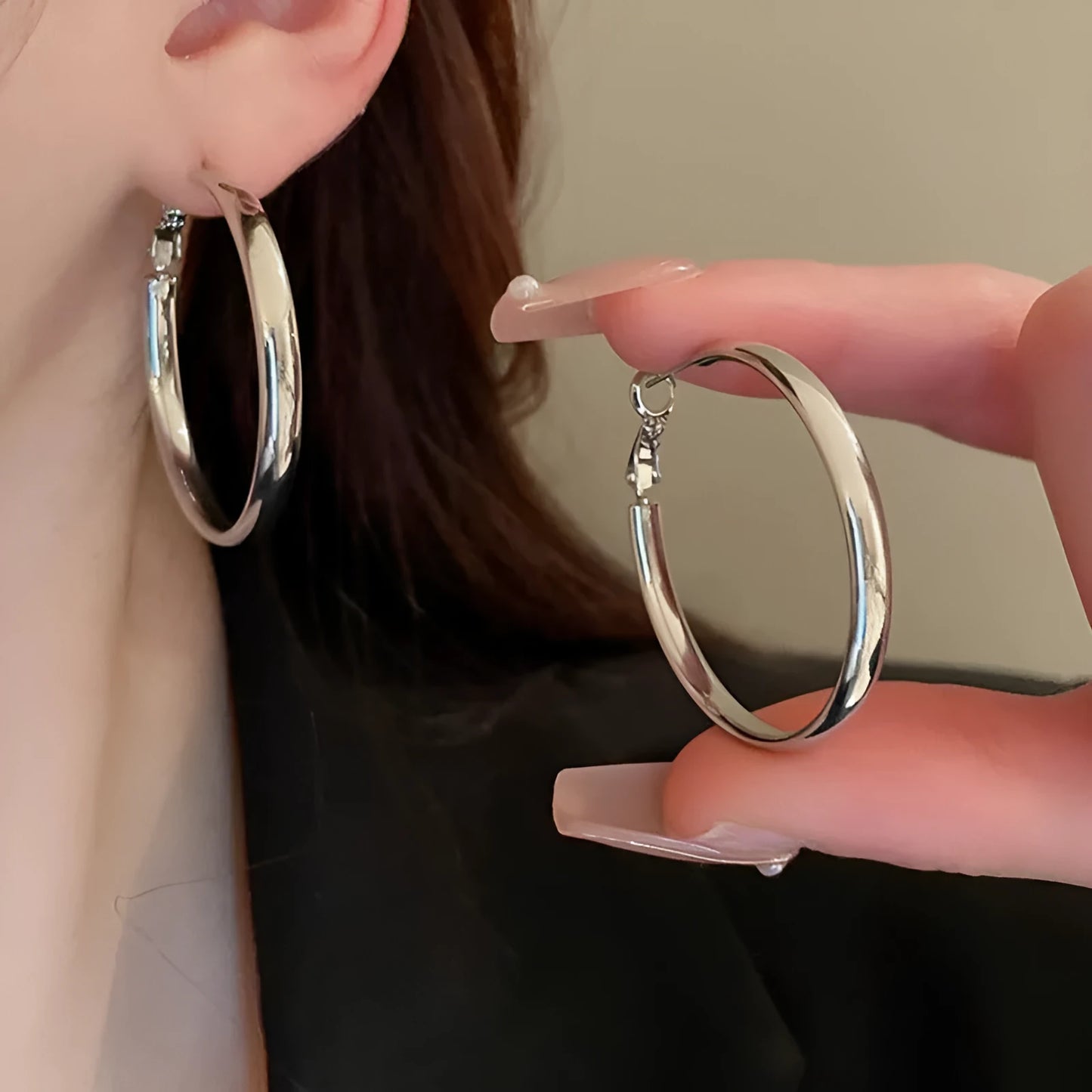 Gold and silver tone 40mm metal circle earrings with electroplated finish