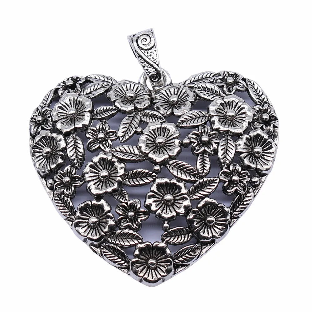 Ancient silver hollow flower love alloy pendant measuring 67mm by 58mm