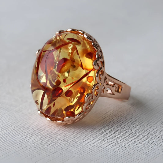 Beeswax ethnic style ring with amber centrepiece in New Amber Type A colour on alloy band