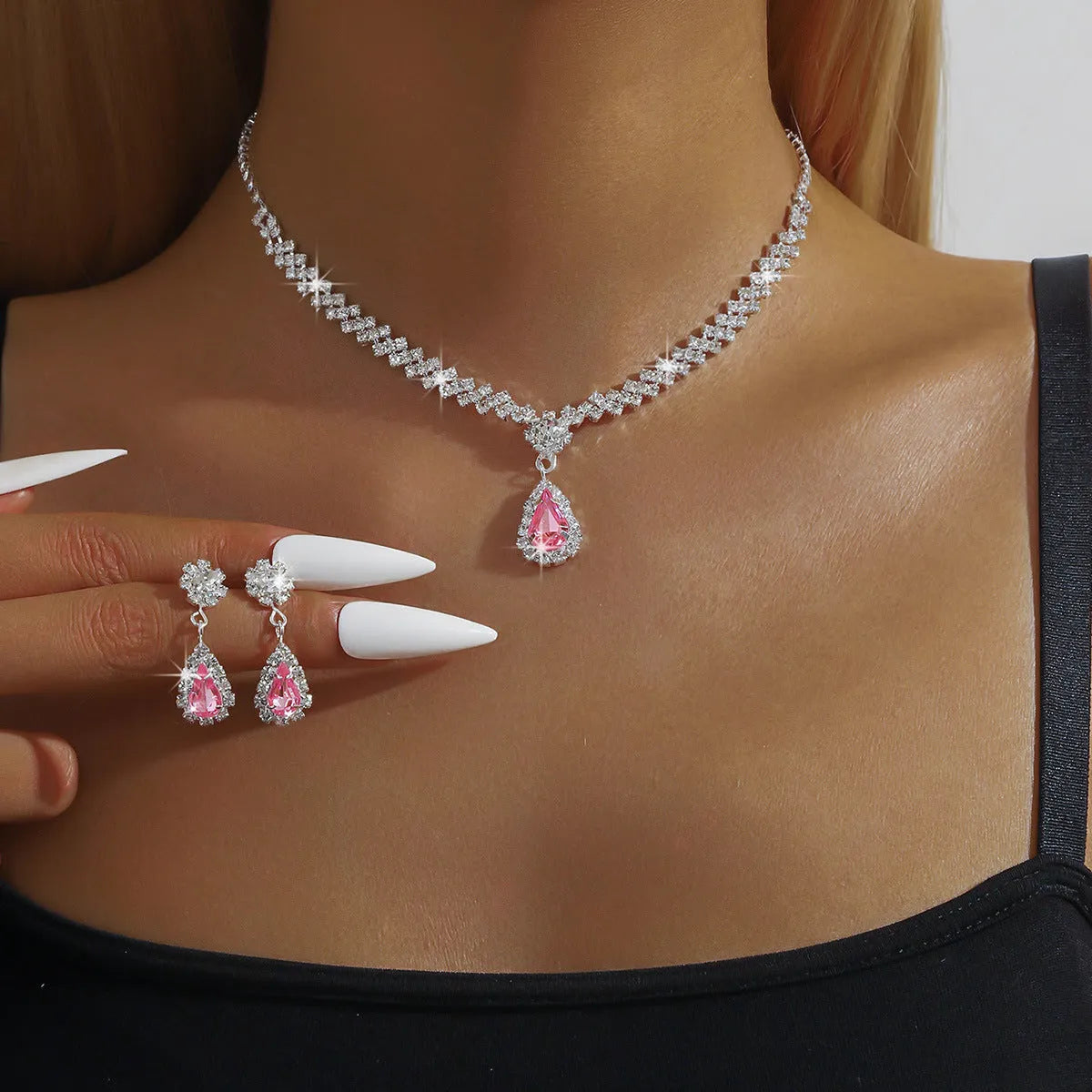 Rhinestone claw chain necklace and earrings set with water drop shaped pendants