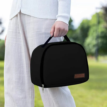 Insulated lunch box bag in sapphire blue textured cloth, shown with a lunch box inside.