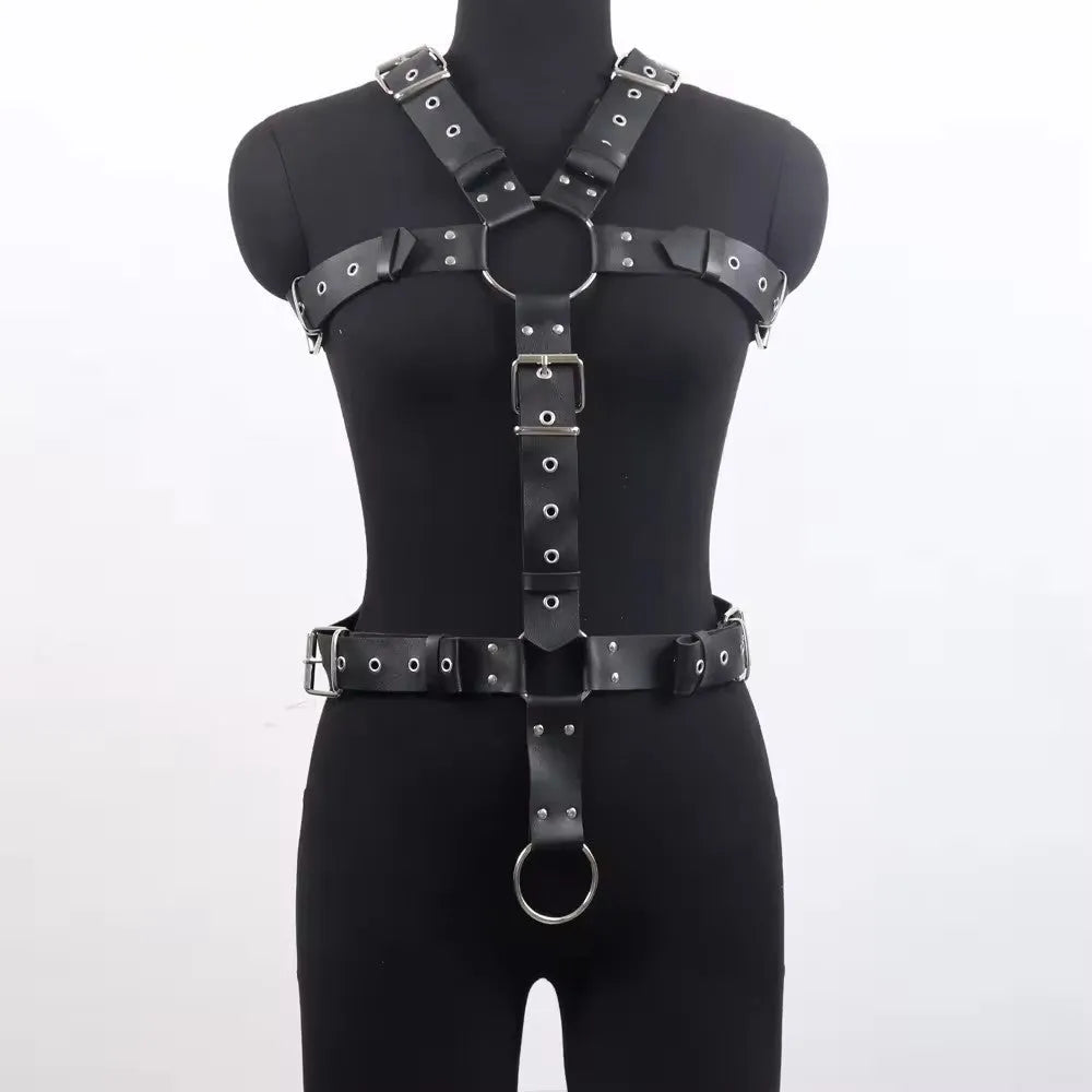 Black imitation leather waist trainer corset with an adjustable buckle and thin straps.