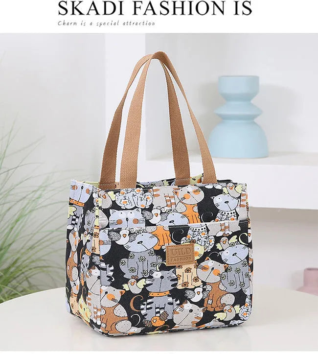 Women's portable printed canvas bag in horizontal square shape with floral design, showing reinforced base and large capacity.