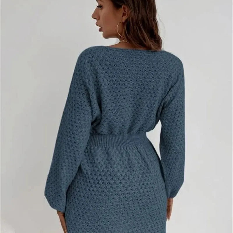 Blue women's dress with hand-crocheted floral details, fitted waist, and 65cm length