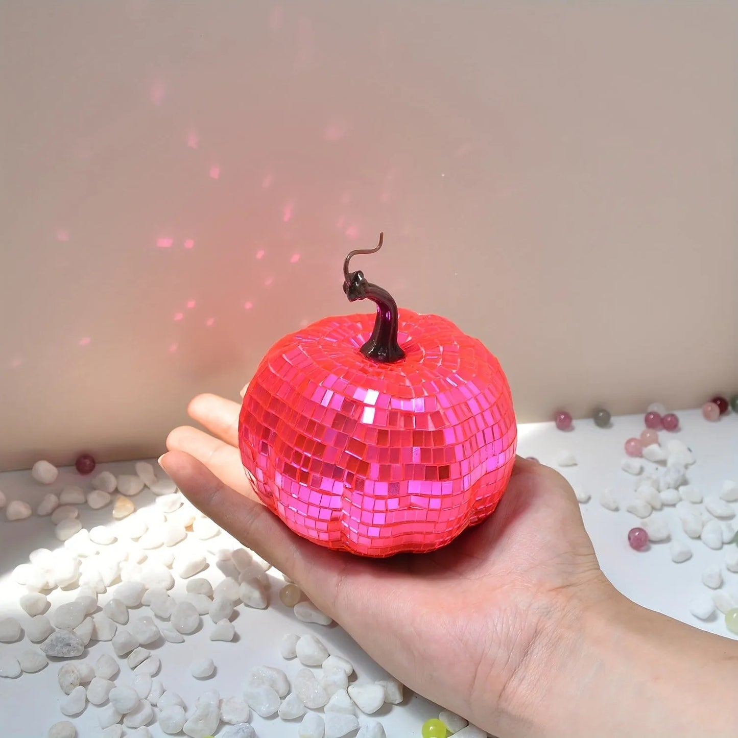 A Chinese-style embroidered glass pumpkin Halloween decoration in various sizes.