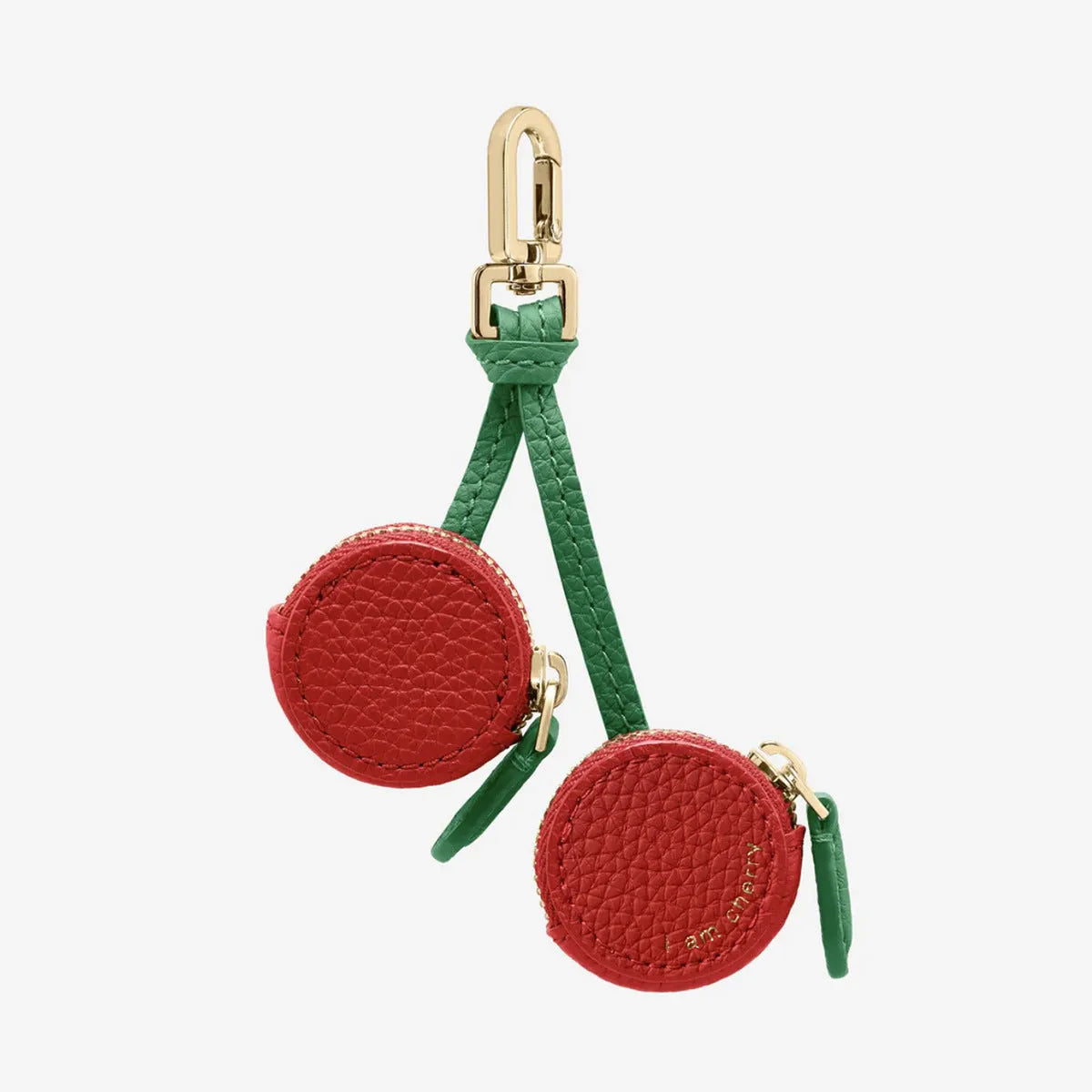 Small solid colour PU leather keychain coin bag in cherry, blueberry, or orange.