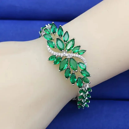 Gold-electroplated copper bracelet with colour zircon stones and ice flower decorative elements