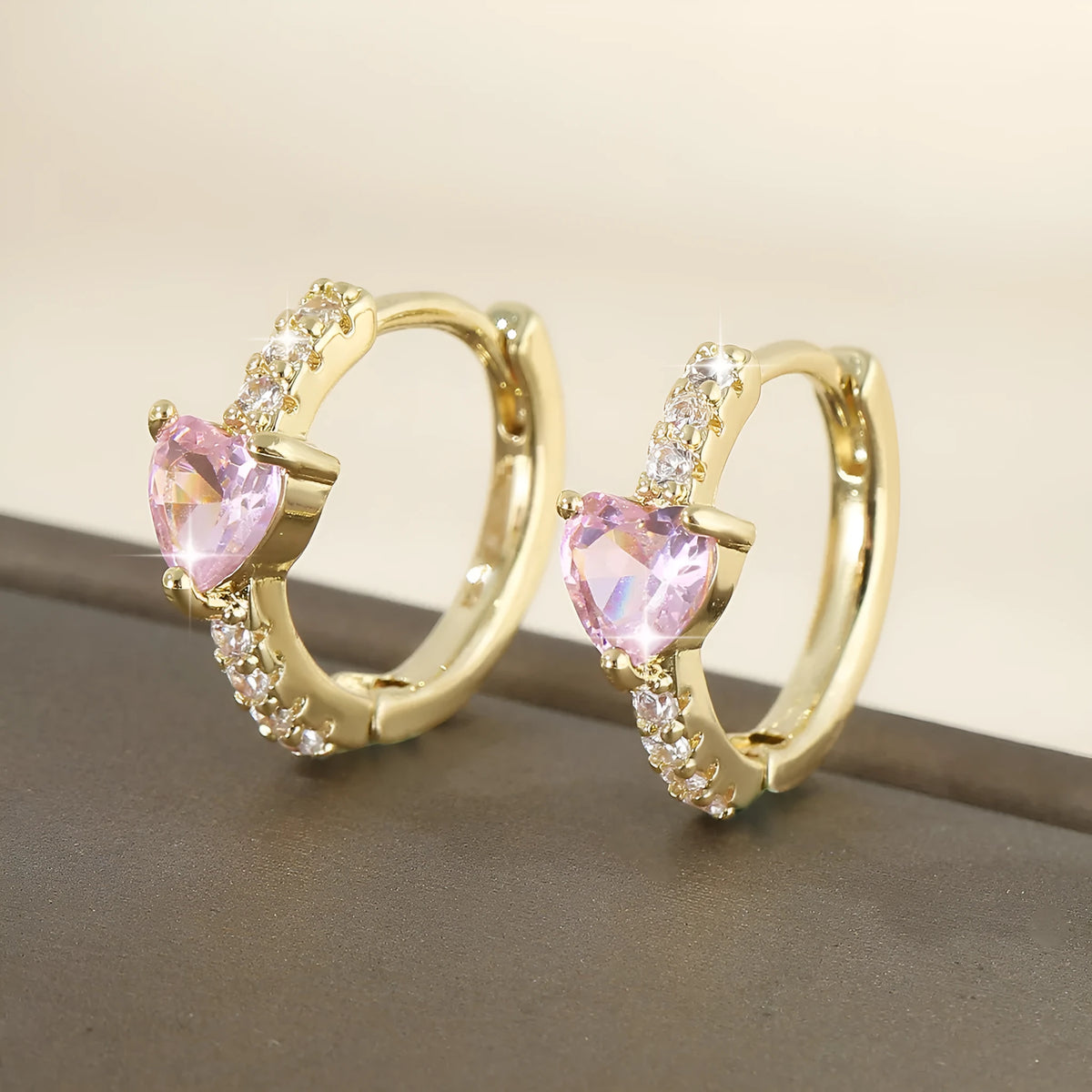 Round love heart copper clip-on earrings in pink, white, and green with geometric design