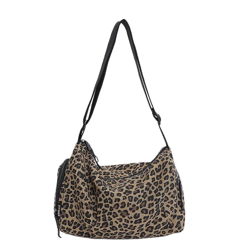 Leopard print sports style shoulder messenger bag with visible stitching and cross-body strap
