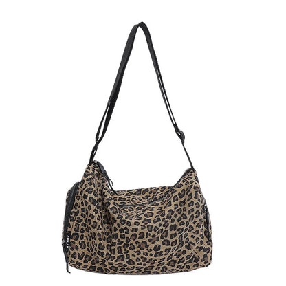 Leopard print sports style shoulder messenger bag with visible stitching and cross-body strap