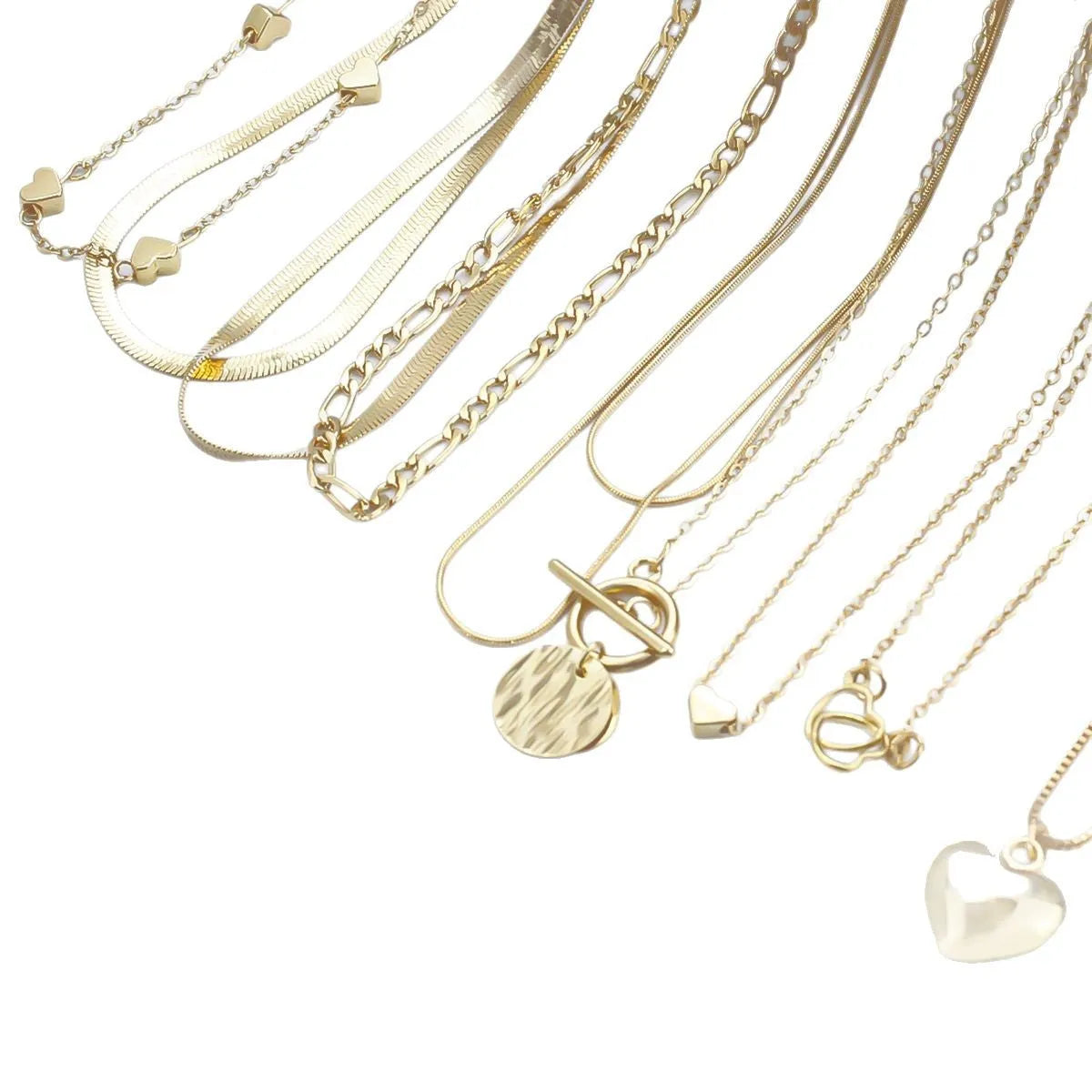 10 gold necklaces with adjustable chains from 21cm to 50cm, featuring electroplated alloy pendants on snake bone chains