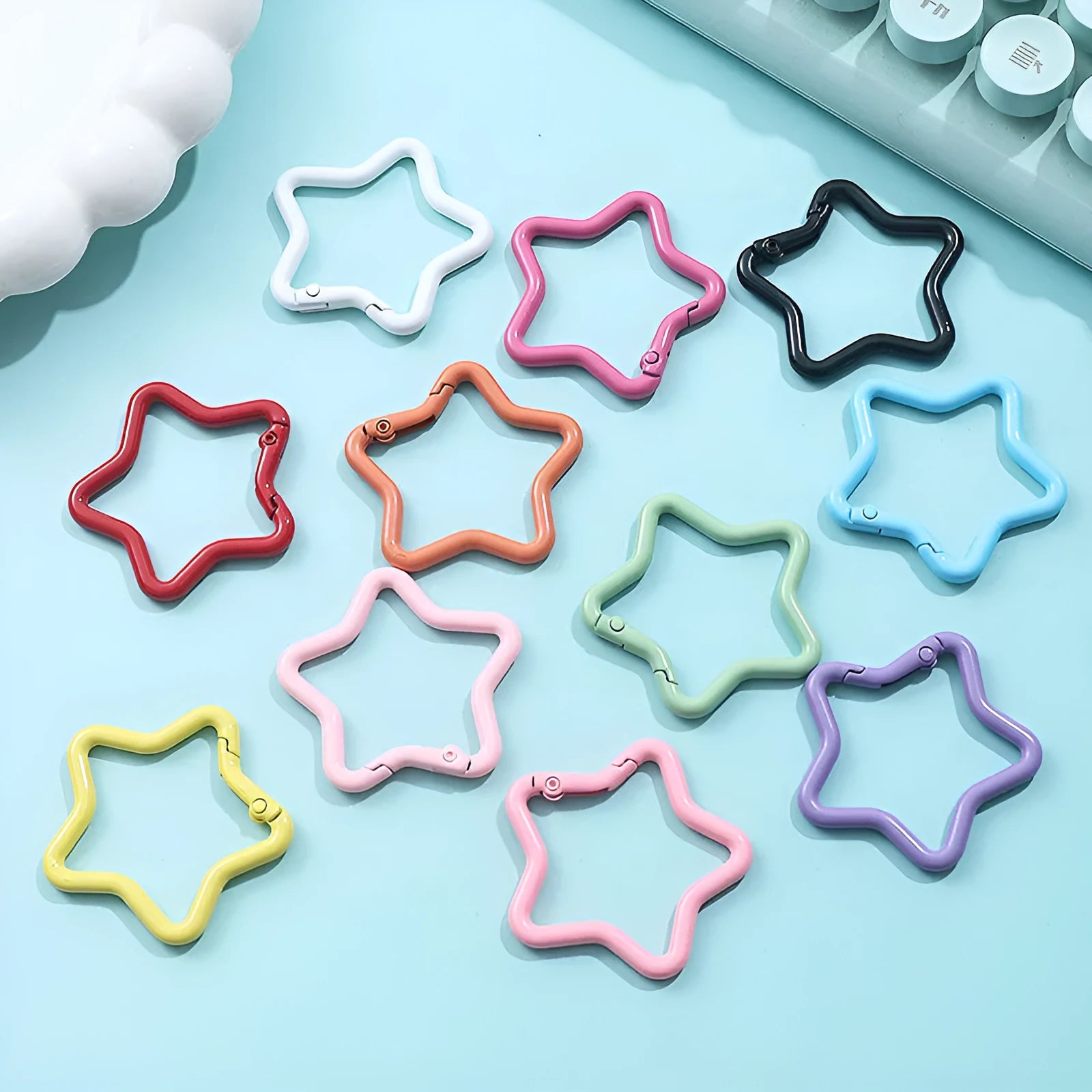 Zinc alloy five-pointed star keychain in various macaron colours.