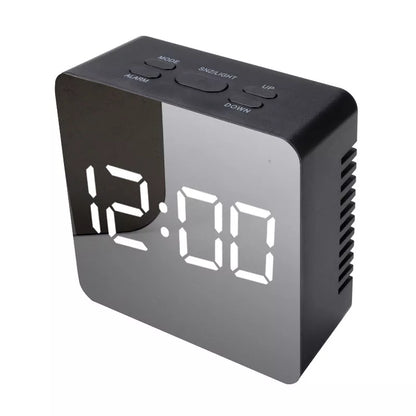 LED Digital Mirror Alarm Clock with customizable light colors on a desktop