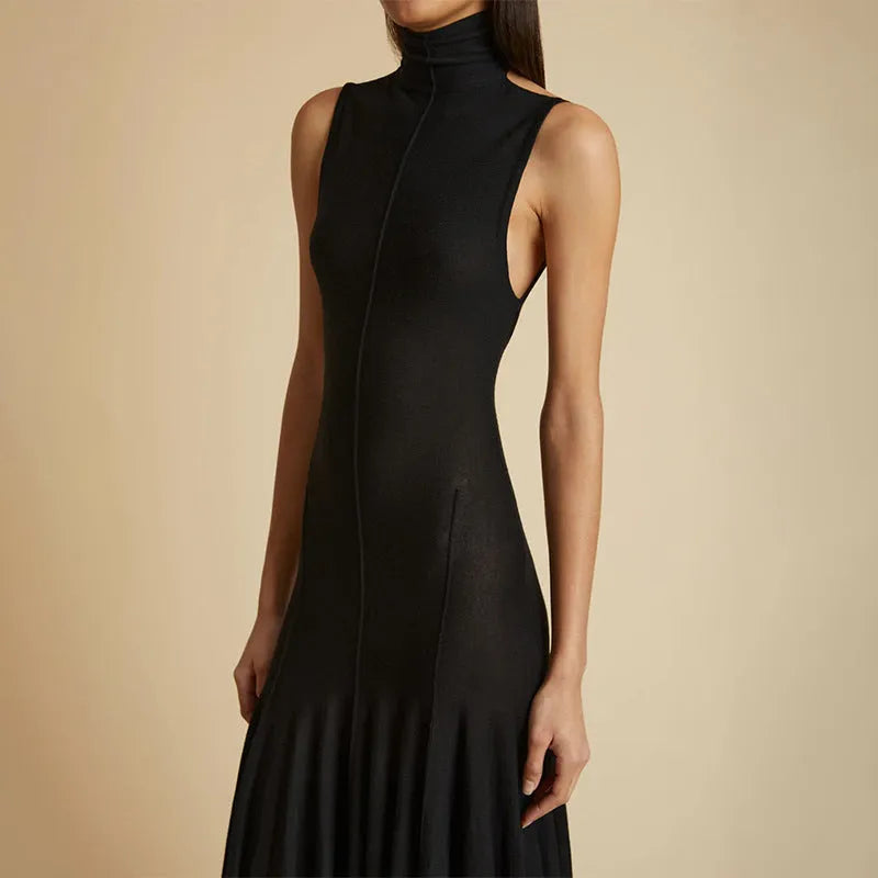 Grey women's slim-fit cotton dress with a half turtleneck neckline, backless design, high waist, and sleeveless cut.