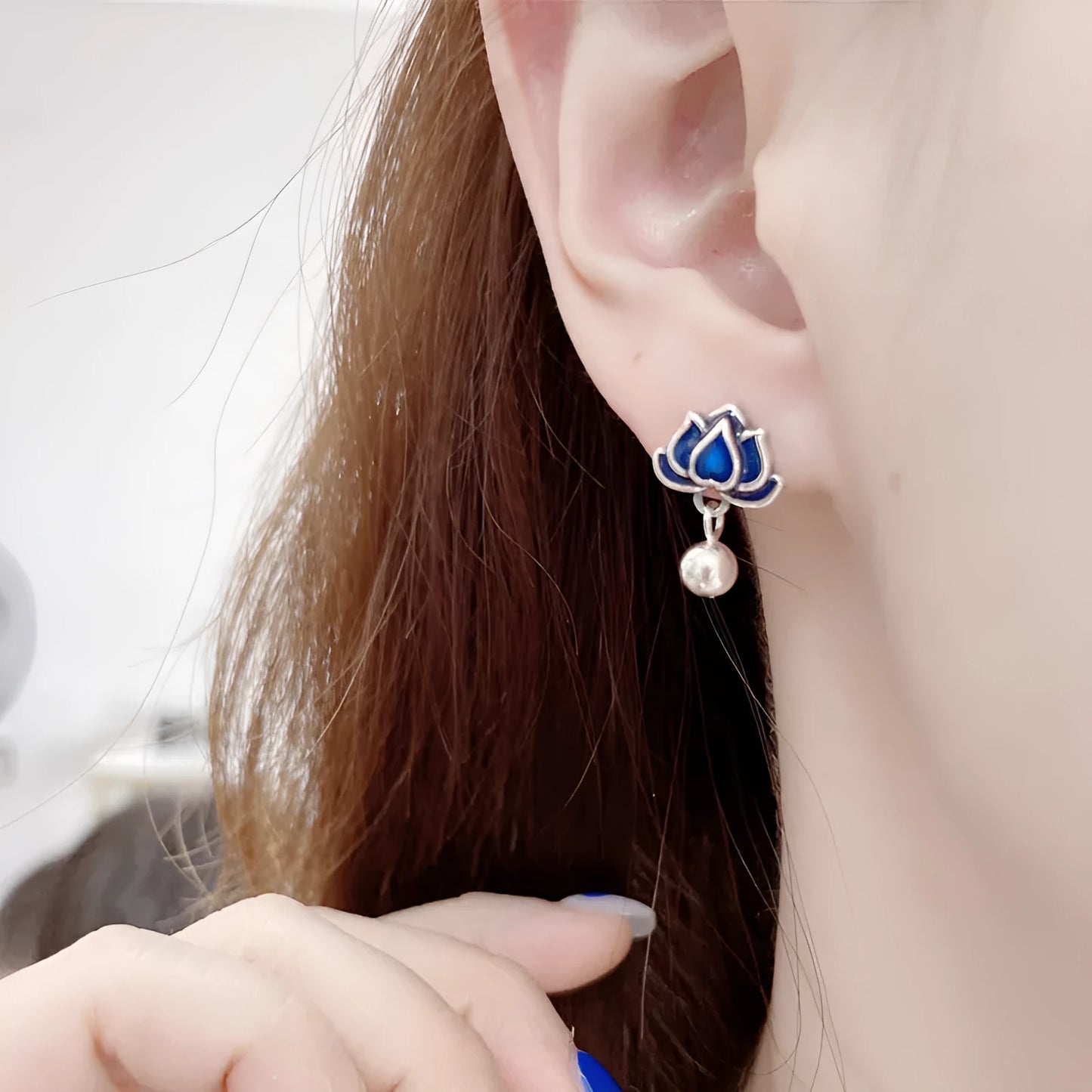 Blue Lotus Earrings with 1.2cm width lotus flower design and seedpod tassel detail