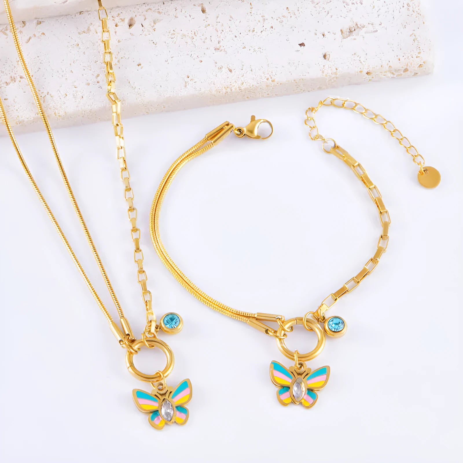 Gold titanium steel jewellery set with colourful epoxy butterfly pendant necklace and matching bracelet