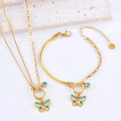 Gold titanium steel jewellery set with colourful epoxy butterfly pendant necklace and matching bracelet