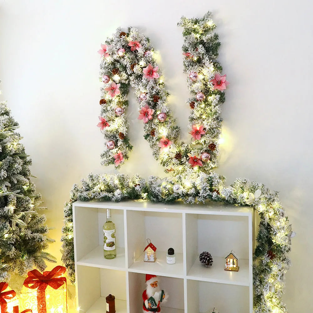 PVC Christmas rattan garland with flocked decoration in golden colour, draped as a festive vine.