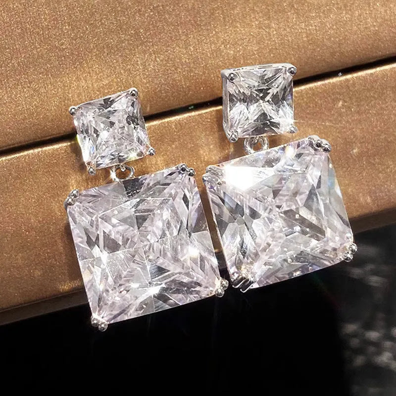 Geometric square copper earrings in white gold or gold colour with quadrilateral design for women