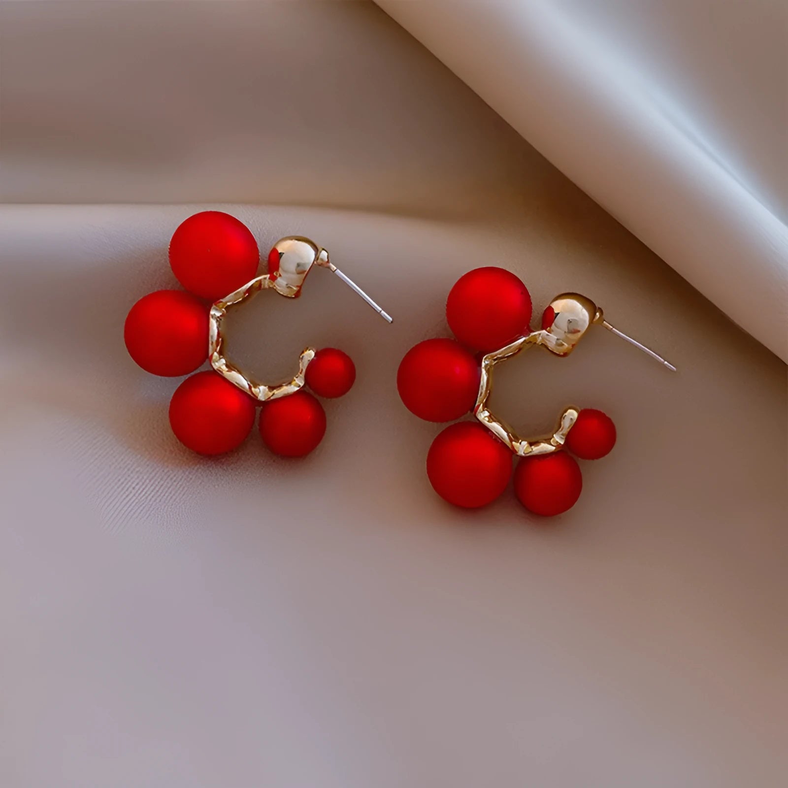 Red alloy bell-shaped drop earrings for women, showing 2.5cm length.