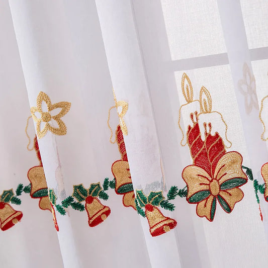 Pair of white Christmas curtains with embroidered snowflake design, semi-sunshade fabric for light control.