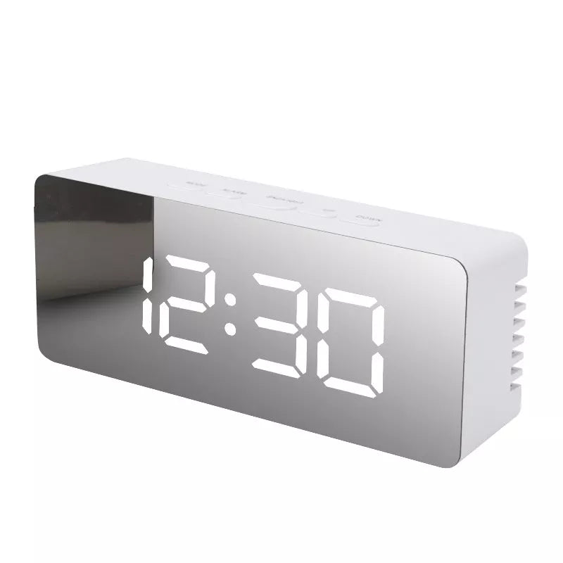 LED Digital Mirror Alarm Clock with customizable light colors on a desktop