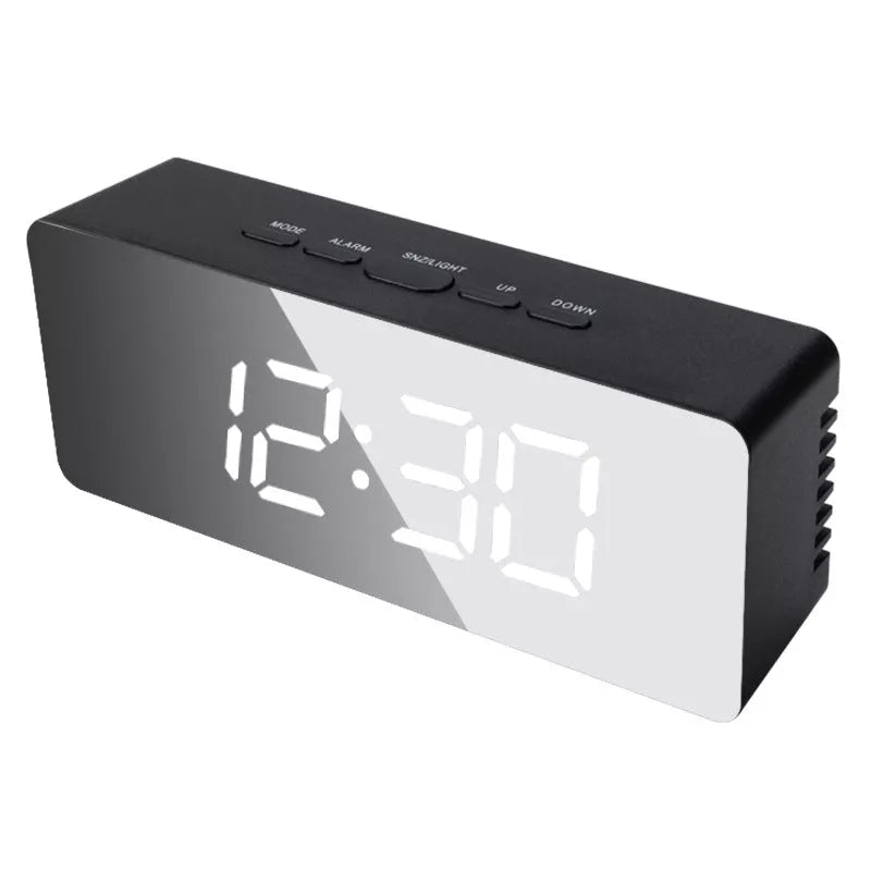 LED Digital Mirror Alarm Clock with customizable light colors on a desktop