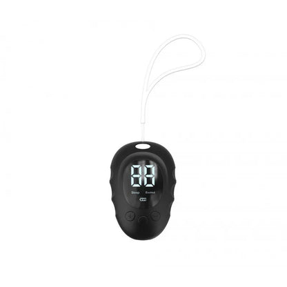 Silicone sleep aid hand grip in white, black, and green colours with sleep monitor and charging cable