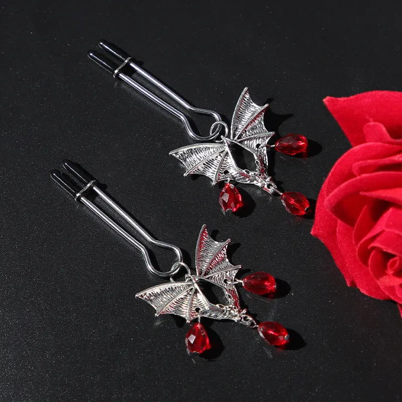 Silver bat nipple clamp with ruby design and adjustable spring mechanism