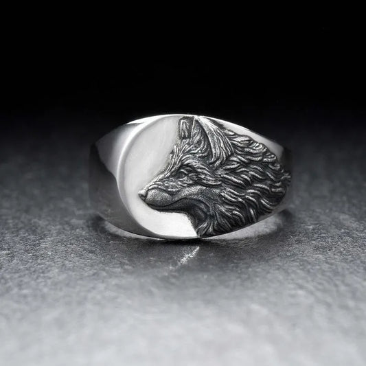 Men's silver geometric wolf ring with angular design on finger, showing alloy construction and detailed wolf shape