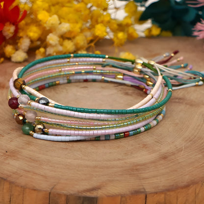 Handmade women's bracelet with colourful geometric glass and coloured glaze beads in Bohemian style.